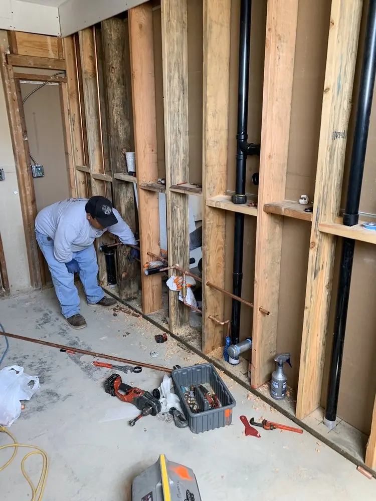 Commercial rough-in plumbing for Water Heater Replacement in Olmstead